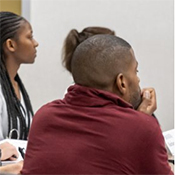 Participants in the DICE program attend classroom-based learning sessions as part of their training.