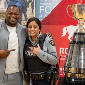 An RCMP officer wears the championship ring of Henoc Muamaba.
