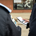 Cadets review their notes, making sure that they have properly documented all of the steps they have taken when seizing the evidence.