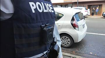 Body worn camera on officer's vest