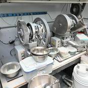 Officers seized significant quantities of chemicals used to manufacture illicit pills.