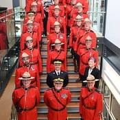 Group of RCMP officers in Red Serge
