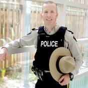 Photo of Cpl. Scotty Schumann, wearing his RCMP general duty uniform.