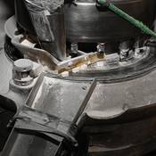 This 16-punch pill press makes large-scale production possible.