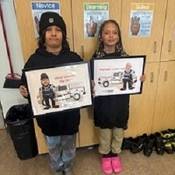 Contest winners with plaques