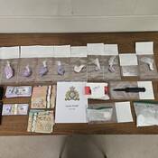 Money and suspected drugs