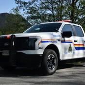 Ridge Meadows RCMP’s first electric vehicle parked on the roadway