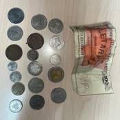 Recovered coins and banknote.