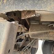 Sheared-off metal on a tractor-trailer stopped by BC Highway Patrol