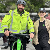 RCMP officer riding an e-scooter