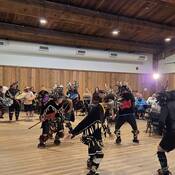 Photo of a powerful performance by the Tzinquaw Dancers, whose vibrant cultural attire and traditional songs brought cultural teachings to life and left a lasting impression on everyone.