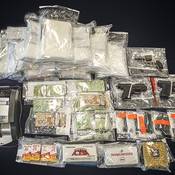 During the investigation, 10 kg of cocaine, three firearms, and approximately $32,000 were seized.