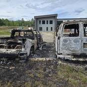 Burned pickup and van