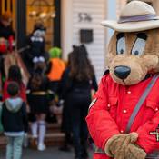 Children in costumes visiting for Halloween.