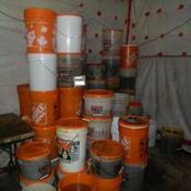 Photo of additional barrels of chemicals discovered by the CLEAR Team inside the clandestine drug lab.
