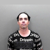 A photo of Bruce Adams, wanted man.