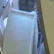 Suspect seen taking a white safe from QEC