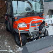 File 2026-551 - Orange 2006 Kubota RTD 900 ATV with snow plow blade attached