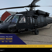 An RCMP Black Hawk helicopter is photographed on the tarmac between patrols.