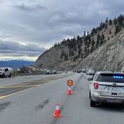 BC Highway Patrol and CVSE officers with commercial vehicles stopped on Highway #97 near Summerland