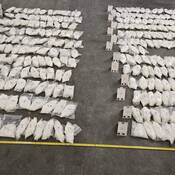 Bags of Methamphetamine that had been concealed inside the jars of pickles.