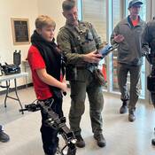 RCMP ERT officer showing robot