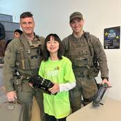 RCMP ERT officers posing with kid