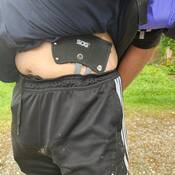 Photo of man with hatchet in his waistband