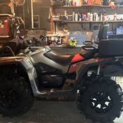 A photo of the stolen ATV, a grey Can Am Outlander