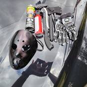 Mask, bear spray, knives, hatchet and gloves found in man's possession