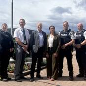 Photo of representatives at today’s HealthIM announcement at Vernon RCMP Detachment in interior B.C.<br />
Left to right: Supt. Michelle Tansey representing the BCACP; Chris Simms, Executive Director of clinical operations, Interior Health; the Honourable Victor Cumming, Mayor of Vernon; Harwinder Sandhu, MLA for Vernon-Monashee; Staff Sergeant Chris Dodds, Revelstoke RCMP and Supt. Roberta Pikola, both representing the Southeast District RCMP.
