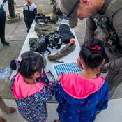 Police Dog Services officer with kids