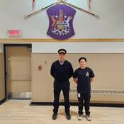 Cst. Dave Hill and Hunter Hohn in the parade hall