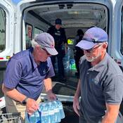 RCMP CP volunteers Alistair Maclean and Kane Summers hard at work
