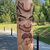 Photo of “The Protector” totem pole in front of the Nootka Sound RCMP Detachment.