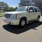 Stock photo of white 2003 Cadillac Escalade