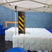 A large number of containers seized as part of the investigation.