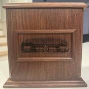 Supt. Atherton’s urn was etched with an image of the Fairmont Barracks building, the site of his original burial beneath a flagpole