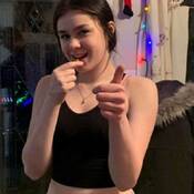 Image of missing youth with dark hair pulled back.