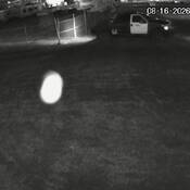 Black and white CCTV image of the suspect vehicle
