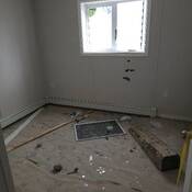 Damaged window inside one of the modular units.