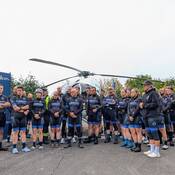 Photo of Inspector Monsef addressing the riders.