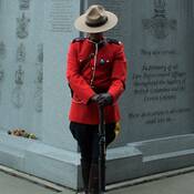 Photo of an officer standing in front of the Bastion memorial.
