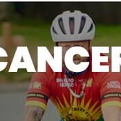 Photo of Cops for Cancer cyclists riding along a street.