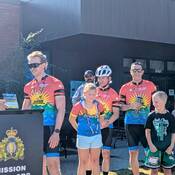 Photo of a presentation between a Cops for Cancer rider and Inspector Ray Monsef.