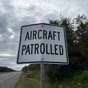 Street sign- Aircraft patrolled