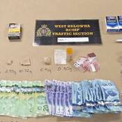 Police seized cash, illicit drugs, and an offensive weapon during traffic enforcement efforts.