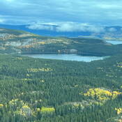 An aerial view of the wilderness surrounding Atlin, B.C. showcases the region’s lakes and forests.