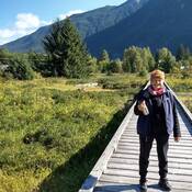 Photo of Laureen Fabian standing on a wooden walkway