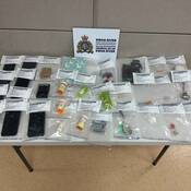 Ten people were arrested and face drug trafficking charges following the execution of search warrants at four Swan River residences on Oct. 1-2.